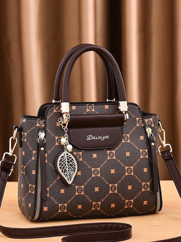 Elegant Women’s Faux Leather Handbag with Red Accents